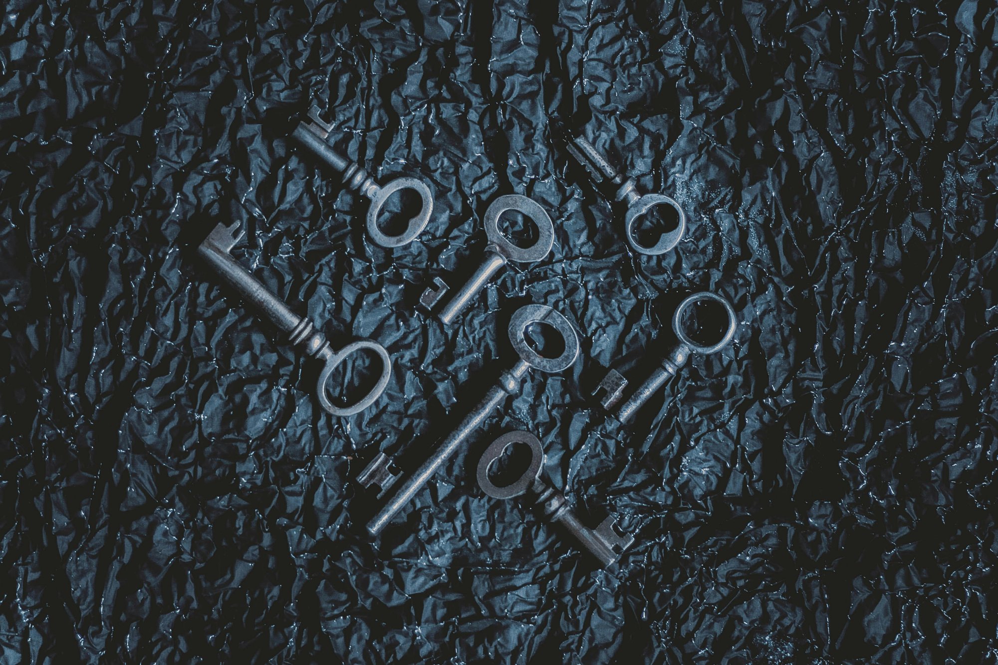 Antique skeleton keys on dark textured paper — TMS vs SPRAVATO decision for treatment-resistant depression, Exxceed Wellness, Hayward CA